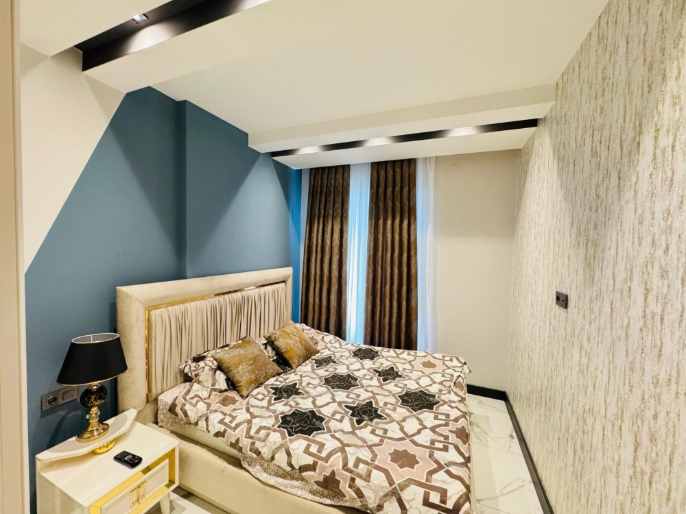 Örnek 1+1 daire – yatak odasıTop floor 1+1, rent guarantee