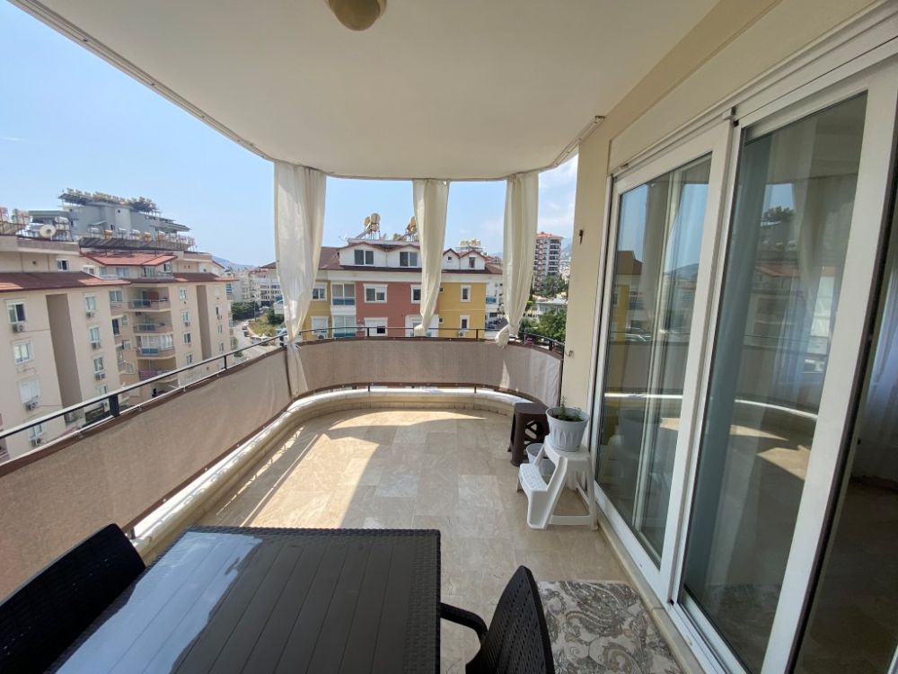 Alanya Cikcilli Satılık 2+1 Eşyalı Daire – Havuzlu, Kısmi Deniz Manzaralı, İkamete Uygun