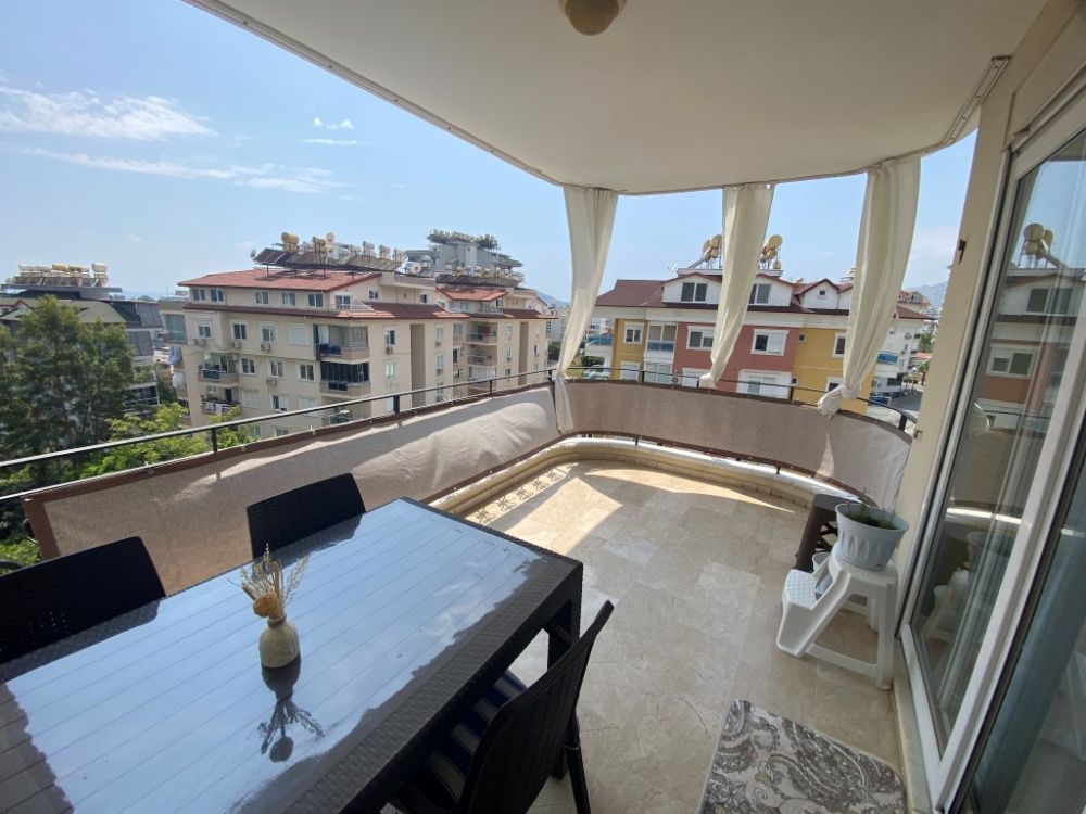 Alanya Cikcilli Satılık 2+1 Eşyalı Daire – Havuzlu, Kısmi Deniz Manzaralı, İkamete Uygun