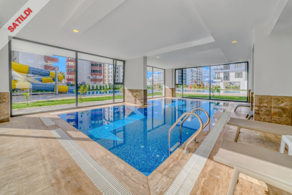 Mahmutlar'da Denize 500 m Eşyalı 1+1 Satılık Daire