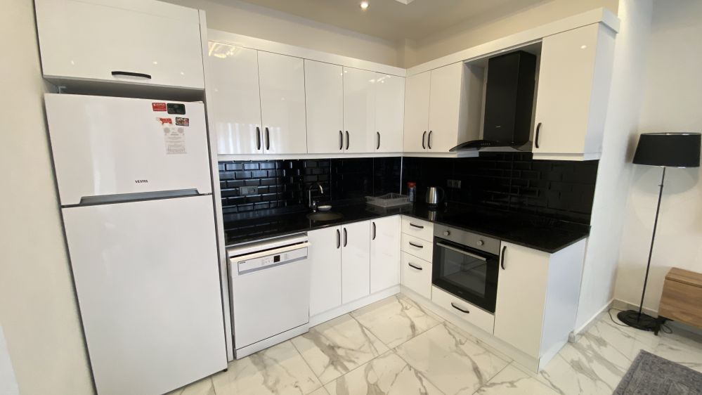 Fenercioğlu Towers 500 м до моря. 1 + 1 Полностью меблированная квартира для продажи