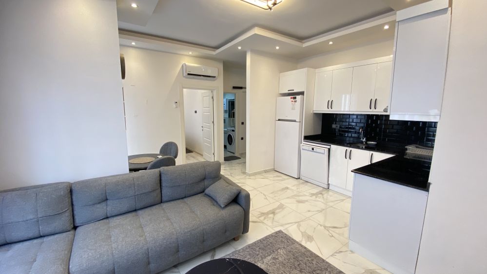 Fenercioğlu Towers 500 м до моря. 1 + 1 Полностью меблированная квартира для продажи