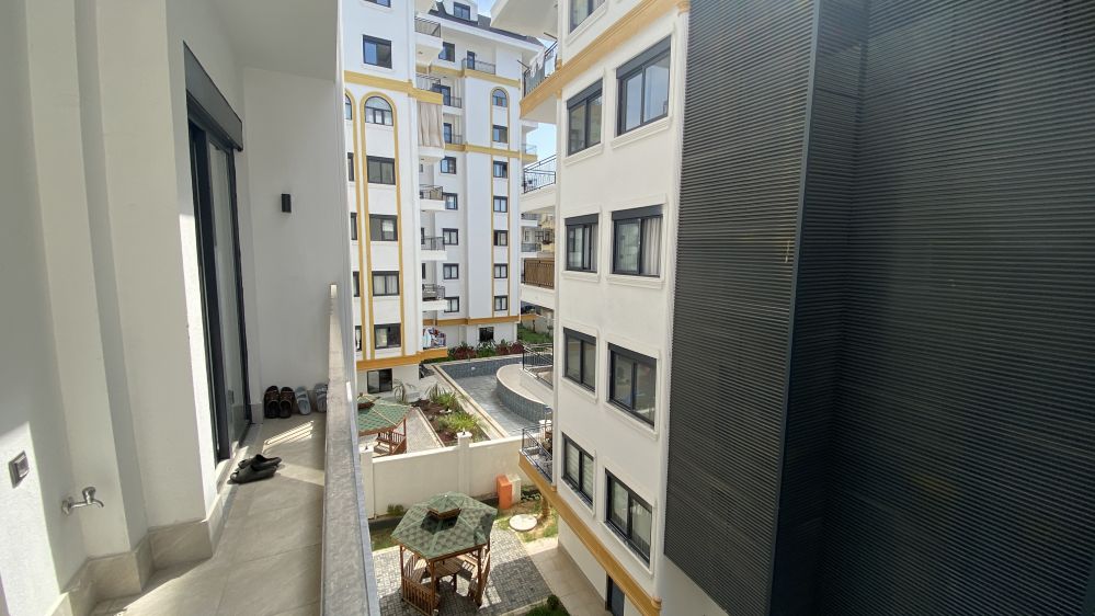 Fenercioğlu Towers 500 м до моря. 1 + 1 Полностью меблированная квартира для продажи