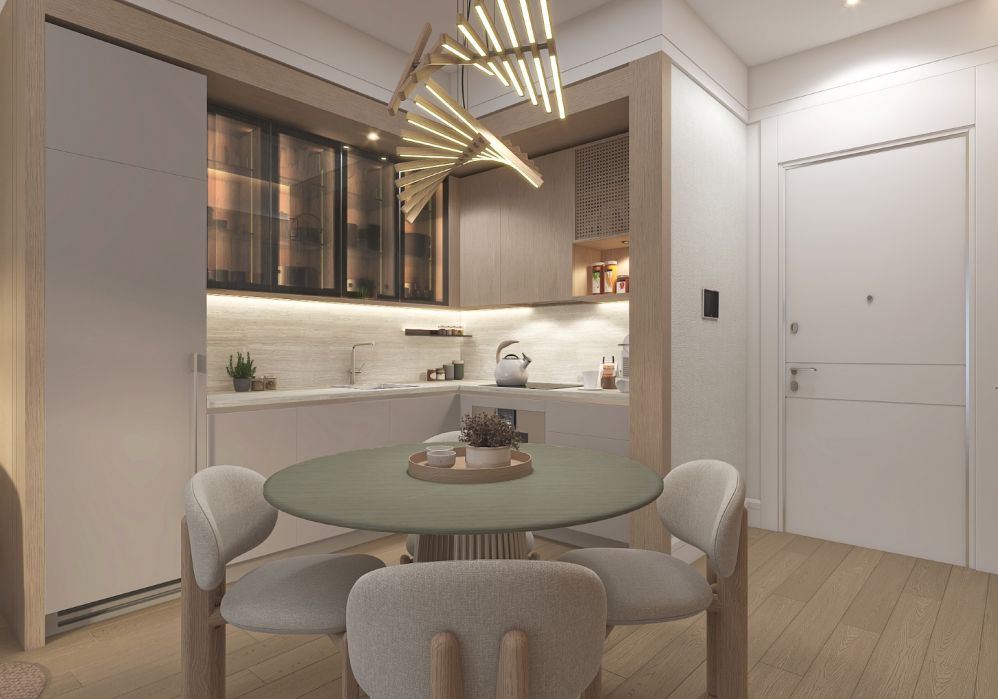 Modern kitchen and dining area with soft lighting and clean interior aesthetics.Luxury High-Ceiling Apartments in Antalya