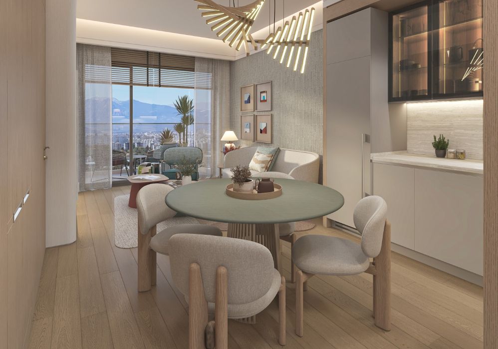 Contemporary dining area and open kitchen interior layout.Luxury High-Ceiling Apartments in Antalya
