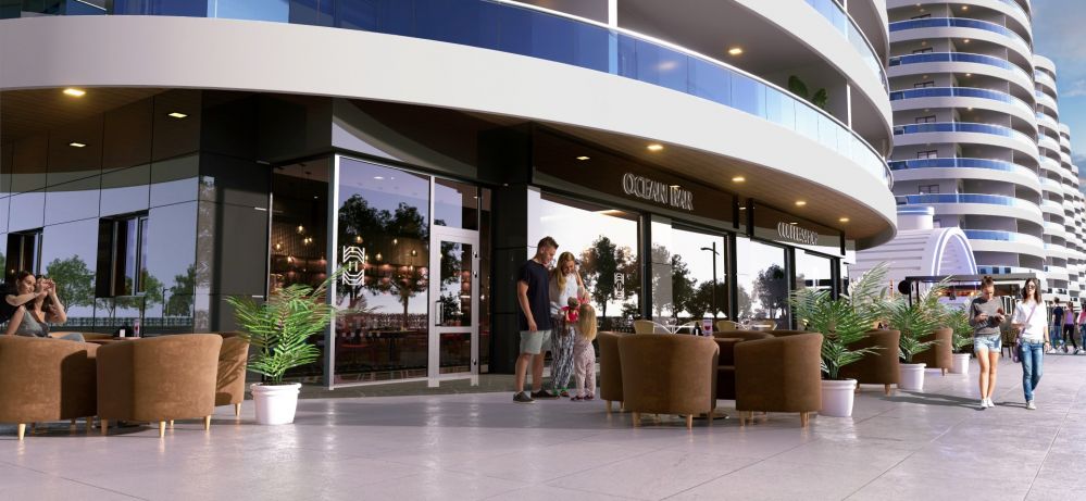 Restoran, kafe ve mağazalarla canlı bir alışveriş alanı.Kıbrıs’ta Denize 600 mt Mesafede Ultra Lüks Konut Projesi