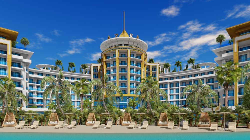 Зоны у бассейна и социальные пространства, окружённые тропическими садами.Роскошный жилой комплекс у моря в районе Тюрклер, Аланья