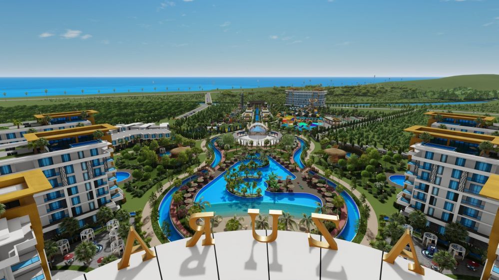 Центральная зона бассейна и прогулочные дорожки внутри комплекса.Роскошный жилой комплекс у моря в районе Тюрклер, Аланья