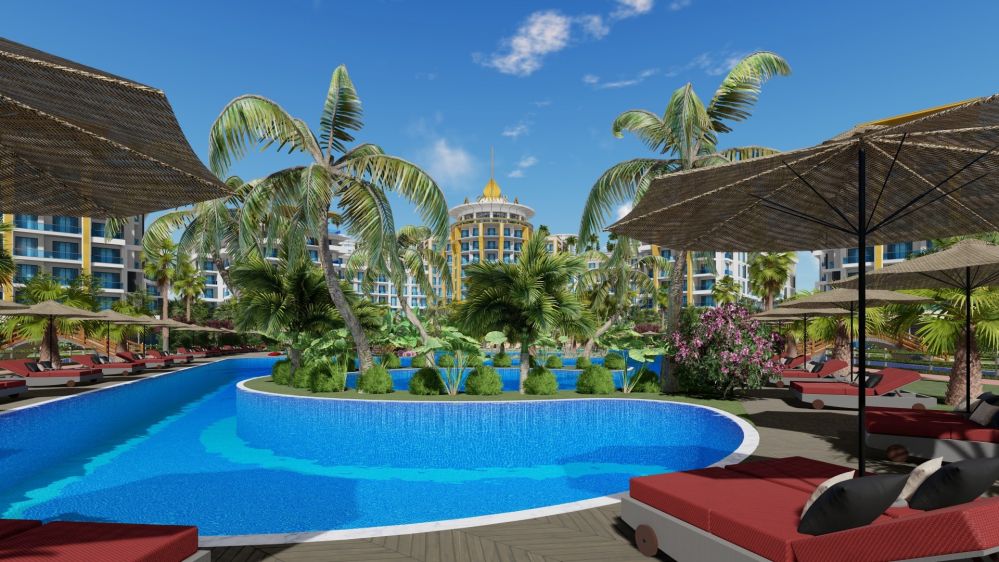 Зоны релаксации, окружённые пышной тропической растительностью.Роскошный жилой комплекс у моря в районе Тюрклер, Аланья