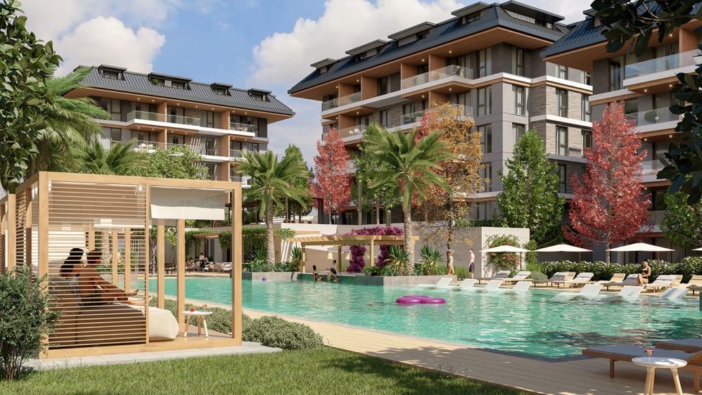 Открытый бассейн и прилегающие зоны отдыха для активной социальной жизни.Элитные квартиры на продажу в районе Оба, Алания — Новый инвестиционный проект