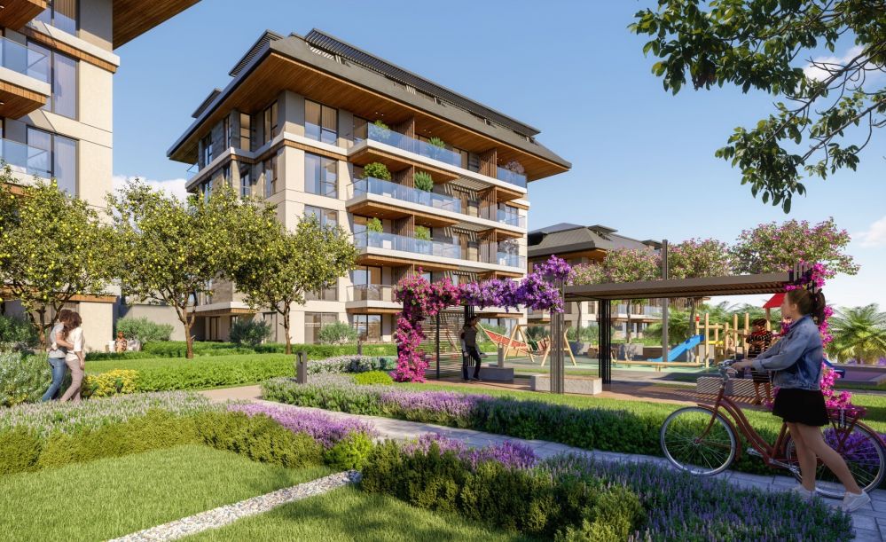 Садовое озеленение и зоны отдыха, предлагающие современную жизнь среди зелени.Элитные квартиры на продажу в районе Оба, Алания — Новый инвестиционный проект