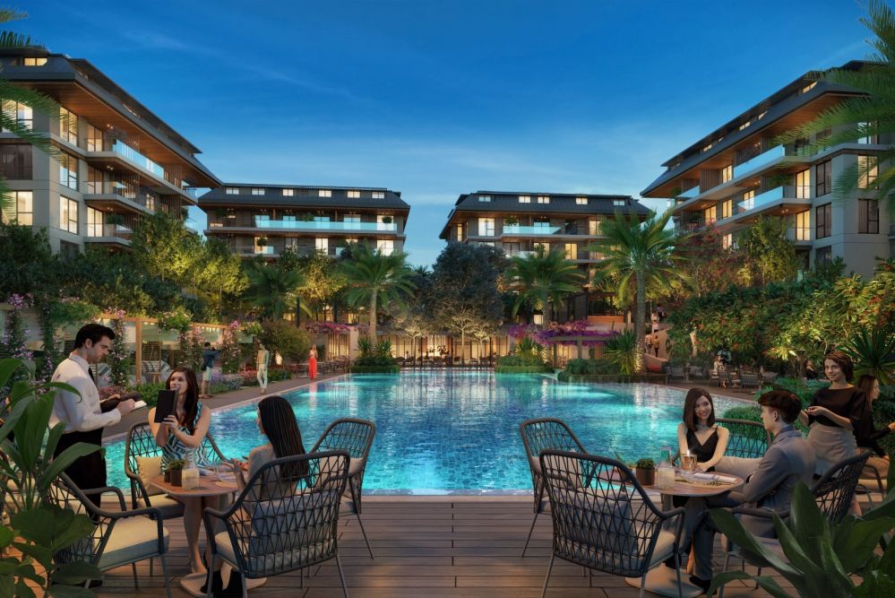 Жильцы наслаждаются освещенной зоной бассейна в ночное время.Элитные квартиры на продажу в районе Оба, Алания — Новый инвестиционный проект