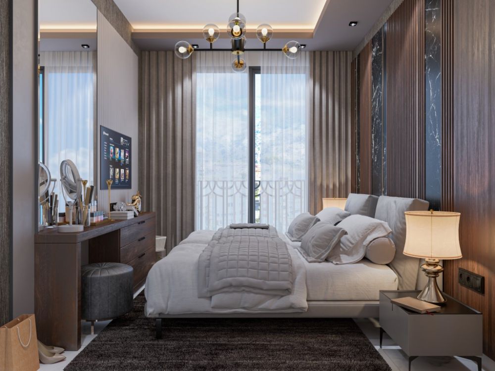 Spacious bedroom with modern touches offering both comfort and aesthetic harmony.Modern Apartments within Walking Distance to Kleopatra Beach