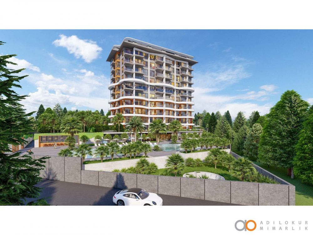 Роскошный жилой комплекс с пальмами и открытым бассейном для комфортного отдыха.Современный жилой комплекс с привлекательными инвестиционными возможностями в Демирташе, Аланья