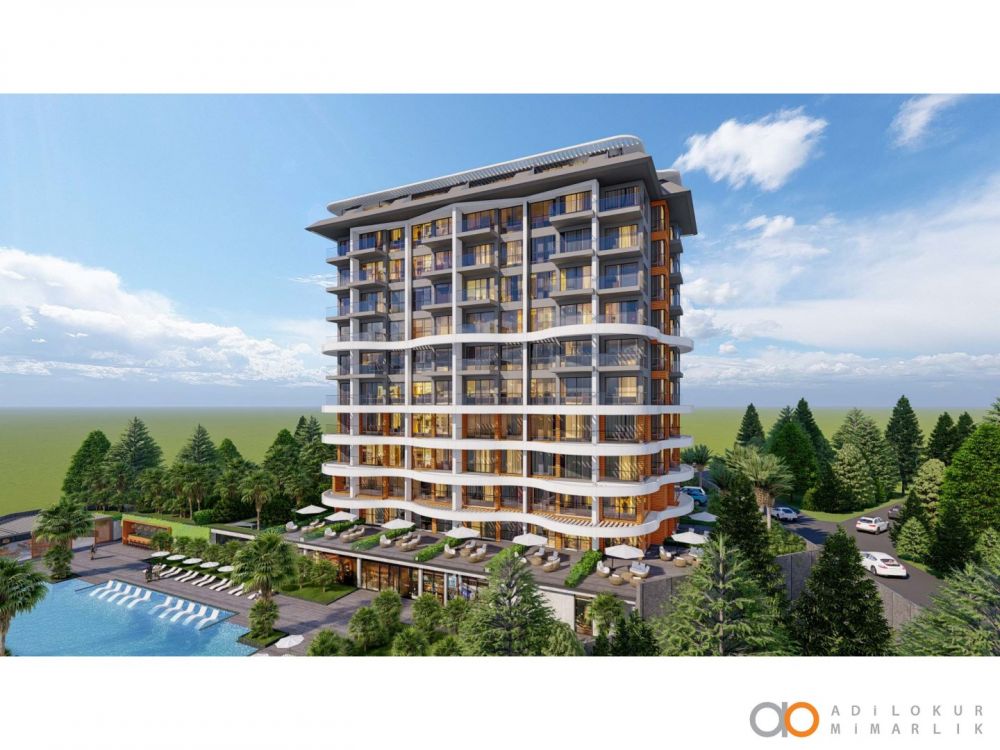 Резиденция в Демирташе с видом на Средиземное море и элегантным современным фасадом.Современный жилой комплекс с привлекательными инвестиционными возможностями в Демирташе, Аланья