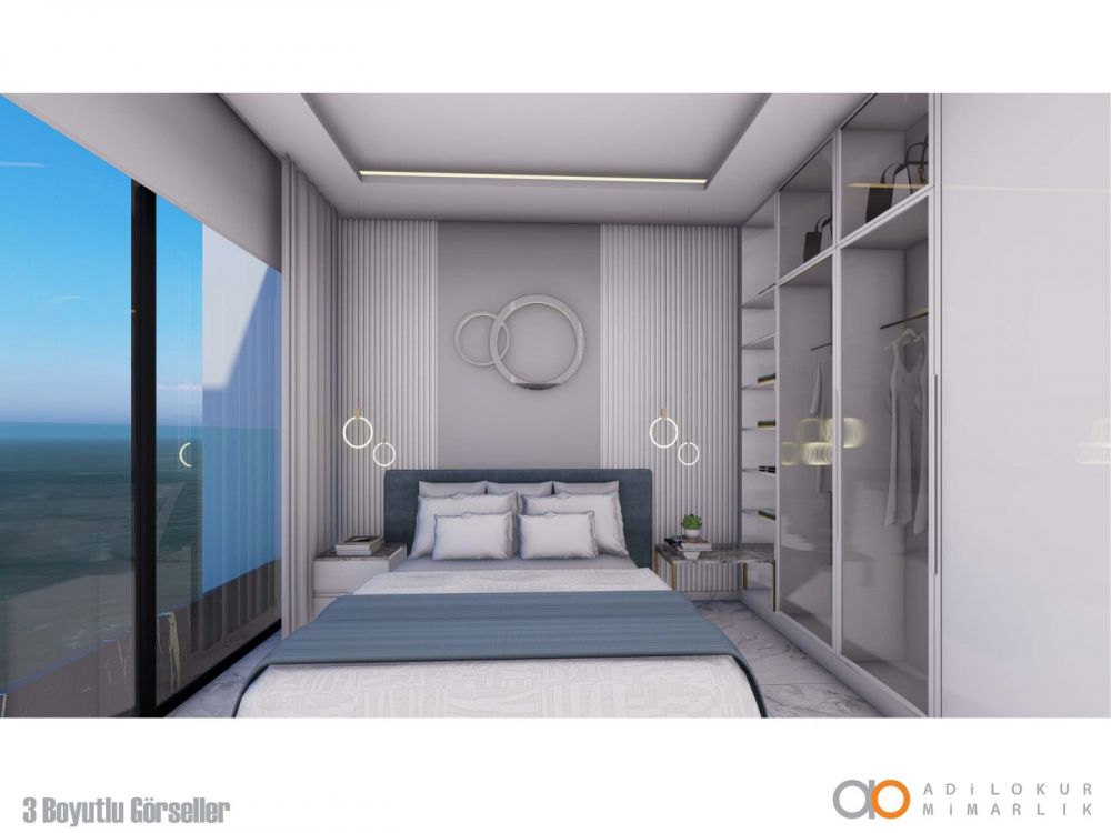 Главная спальня в минималистичном стиле с видом на балкон.Современный жилой комплекс с привлекательными инвестиционными возможностями в Демирташе, Аланья