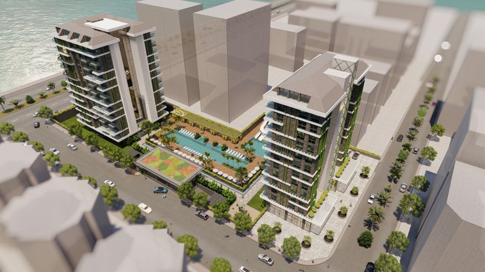 Proje genel görünümü – iki bloktan oluşan modern site kompleksi.Alanya Mahmutlar'da Denize Sıfır ve Merkeze Yakın Yeni Ultra Lüks Konut Projesi