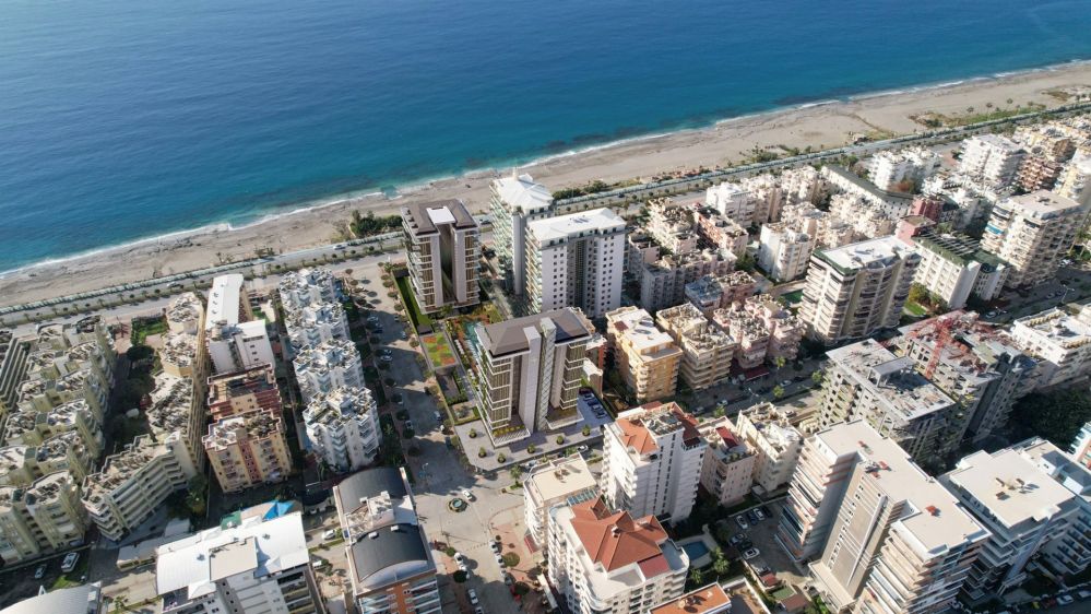 Projeye yakın sahil hattı ve yürüyüş yolları – Mahmutlar Alanya.Alanya Mahmutlar'da Denize Sıfır ve Merkeze Yakın Yeni Ultra Lüks Konut Projesi