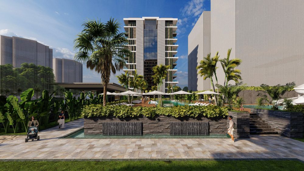 Modern bahçe düzenlemesiyle deniz manzaralı huzurlu yaşam alanı.Alanya Mahmutlar'da Denize Sıfır ve Merkeze Yakın Yeni Ultra Lüks Konut Projesi