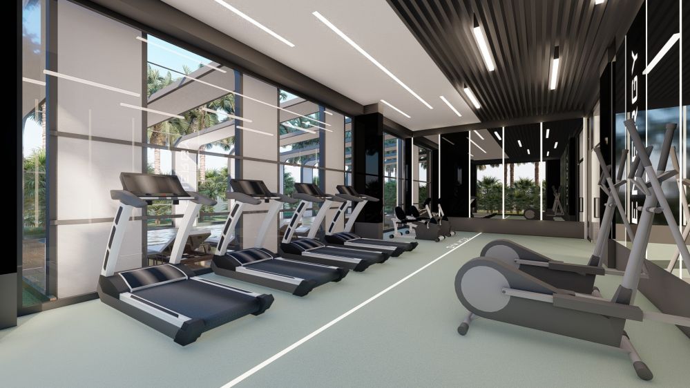 Fully equipped fitness center with professional training equipment.Seafront Luxury Apartments in Mahmutlar – New Investment Project in Alanya
