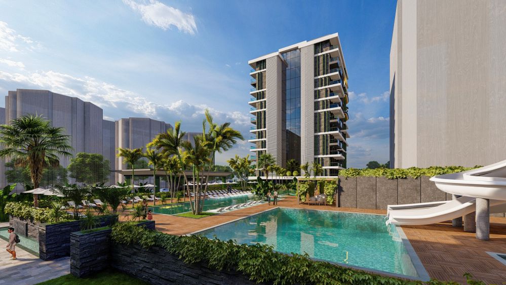Spacious pool area and landscaped gardens for a comfortable lifestyle.Seafront Luxury Apartments in Mahmutlar – New Investment Project in Alanya