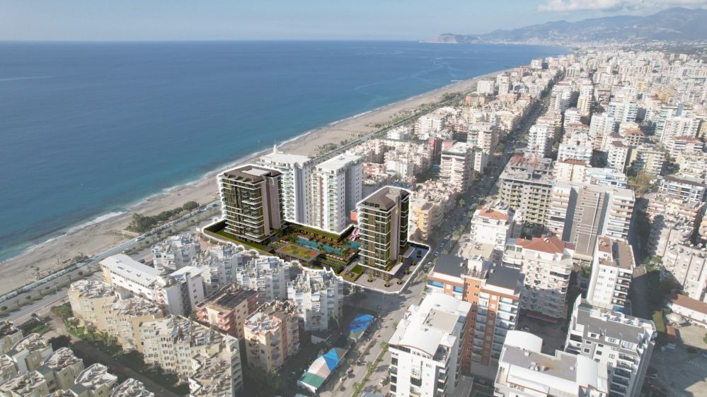 Sahile sıfır konumda, panoramik deniz manzaralı modern yapı.Alanya Mahmutlar'da Denize Sıfır ve Merkeze Yakın Yeni Ultra Lüks Konut Projesi