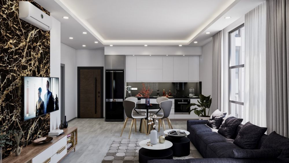 A bright and spacious living room designed in a modern style, with large windows allowing natural light throughout the day.Modern Residential Project in Mahmutlar Alanya