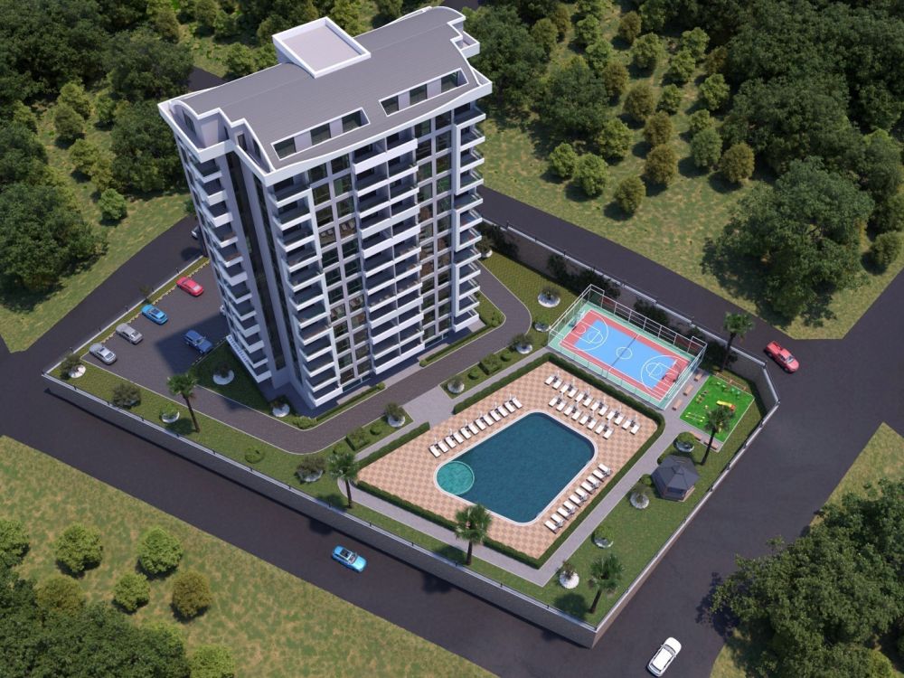 A modern residential project in Mahmutlar, Alanya — located close to the sea, offering a large pool, landscaped gardens, and comfortable living spaces.Modern Residential Project in Mahmutlar Alanya