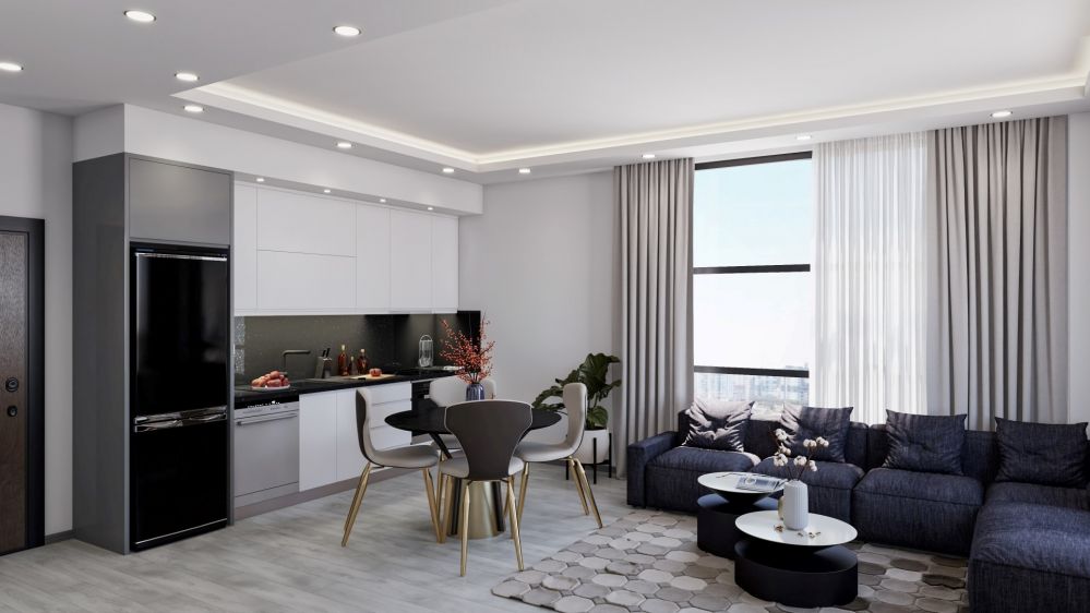 Open-concept kitchen with high-quality built-in appliances and stylish design for modern urban living.Modern Residential Project in Mahmutlar Alanya