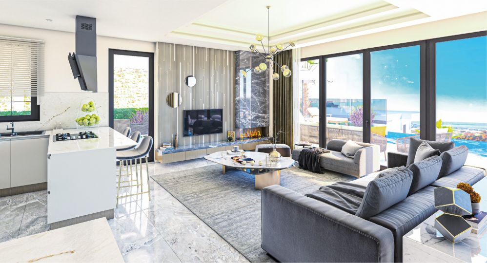 A bright living space with floor-to-ceiling windows that bring Mediterranean sunlight and sea views indoors.Ultra Luxury Sea View Residential Project in Kargicak Alanya