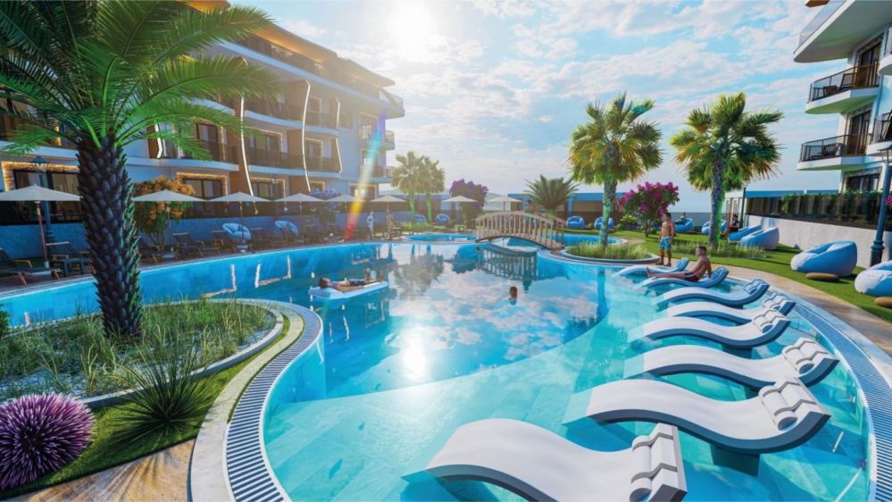 The open swimming pool and sun terraces create an elegant social environment ideal for relaxation and leisure.Ultra Luxury Sea View Residential Project in Kargicak Alanya