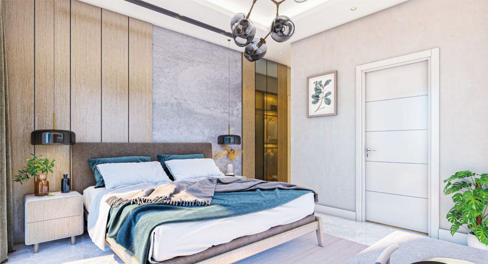 A bright and modern bedroom featuring light tones, natural textures, and spacious design.Ultra Luxury Sea View Residential Project in Kargicak Alanya