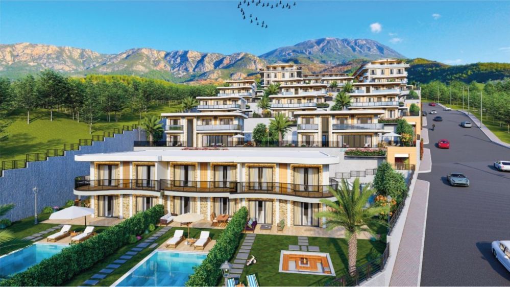 Spacious terraces, wide glass façades, and open balconies allow natural light to fill every corner of the home.Ultra Luxury Sea View Residential Project in Kargicak Alanya