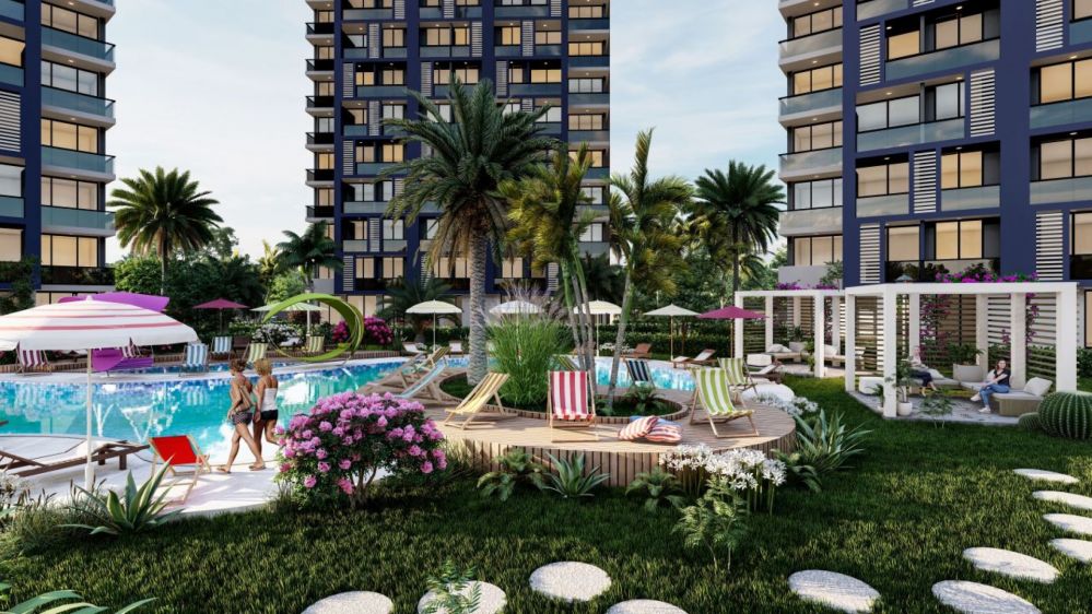 Aile yaşamına uygun yüzme havuzu, peyzajlı bahçe ve sosyal alanlara sahip modern konut projesi.Mersin – Tece Bölgesinde Yatırıma Uygun Lüks Konut Projesi